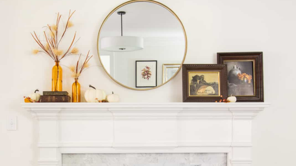 Art In Front of Mirror on Fireplace Mantel