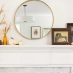 Art In Front of Mirror on Fireplace Mantel